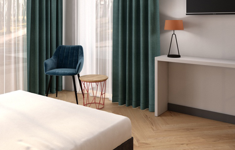 Room with a bed and armchair at “Da Home urban hotel”